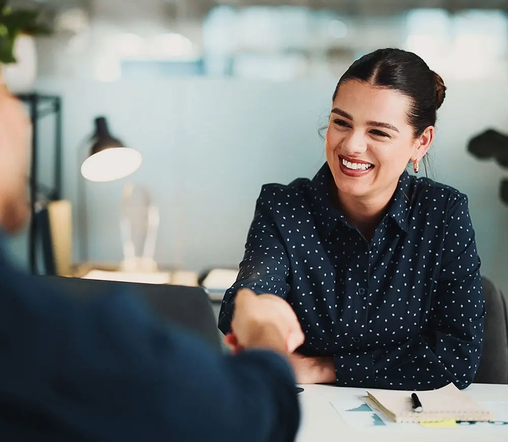 Woman at desk doing business